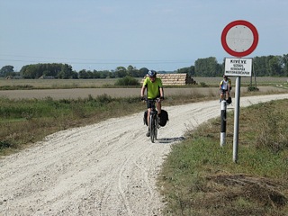 Cycling along a rough gravel road in Hungary